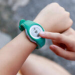 Clock Beats Calories for Diabetes Prevention Person using a fitness tracker on their wrist