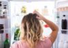 Foods That Lead To The Sharpest Cognitive Decline Person looking into an open refrigerator
