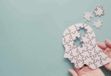 human head puzzle silhouette with missing pieces