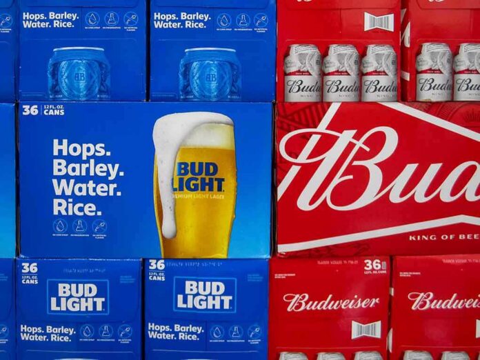 Stacks of Bud Light and Budweiser beer cases