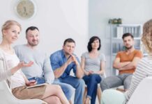 Facilitation or hindrance? The impact of downward social comparison Support group meeting with six adults seated in a circle