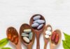 Assorted dietary supplements on wooden spoons