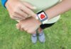 Should You Really Exercise After Eating? Person checking smartwatch heart rate on wrist outdoors